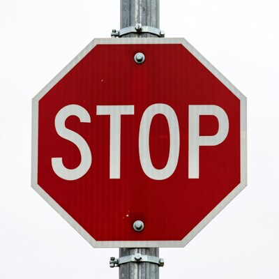 Red Stop Sign on Pole