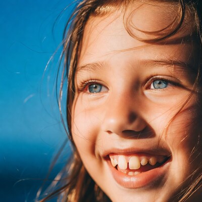 Smiling girl with blue eyes