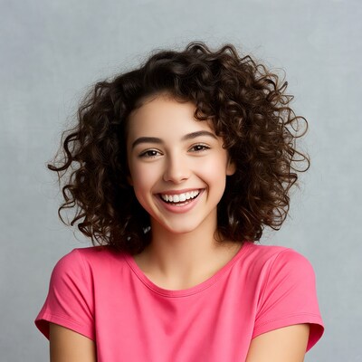 Smiling girl with curly hair