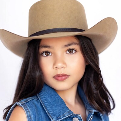 Asian girl in cowboy hat