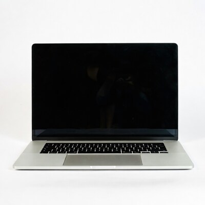 Silver MacBook Pro on white background