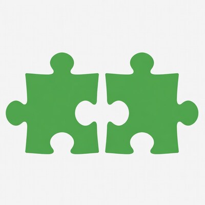 Two green interlocking puzzle pieces