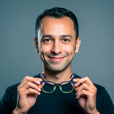 Man holding blue gradient glasses
