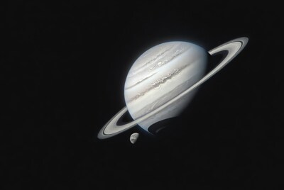 Saturn with rings and moon