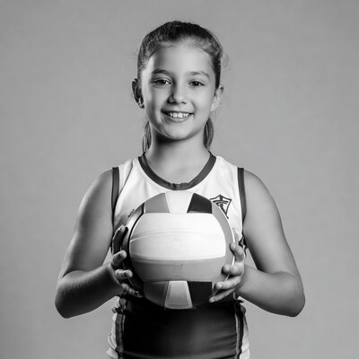 Girl holding volleyball