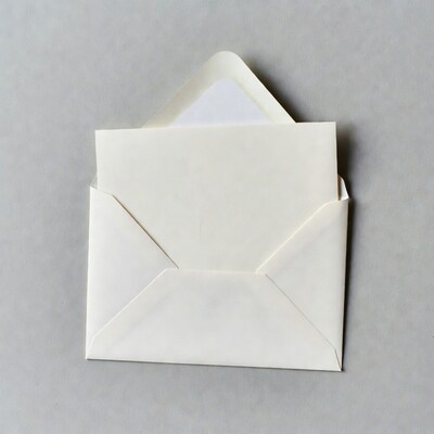 Open white envelope on gray background