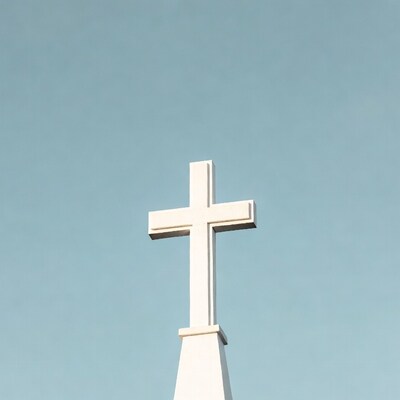 White cross against blue sky