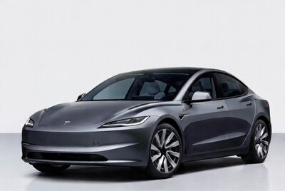 Gray Tesla Model 3 on white background