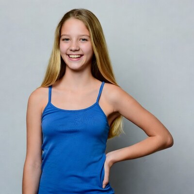 Smiling blonde girl in blue tank top