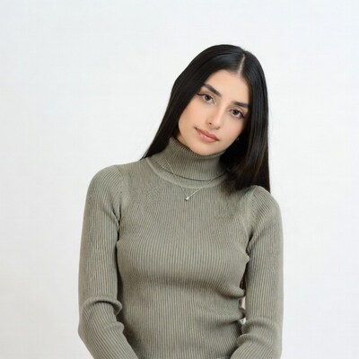 Woman in green turtleneck sweater
