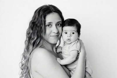 Mother holding newborn baby