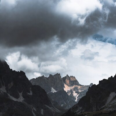 Dramatic Mountains Under Stormy Clouds