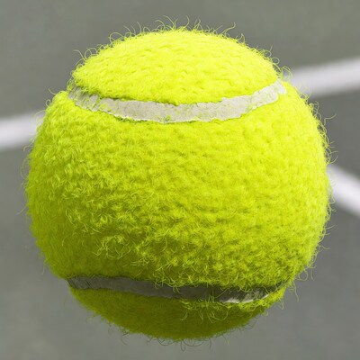 Yellow tennis ball on court