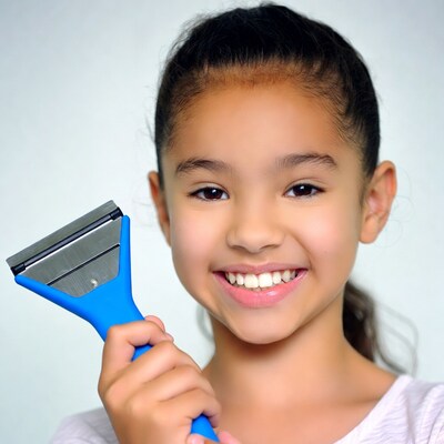 Girl holding blue snow scraper