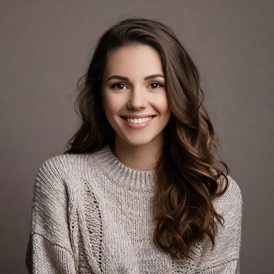Smiling woman in white sweater