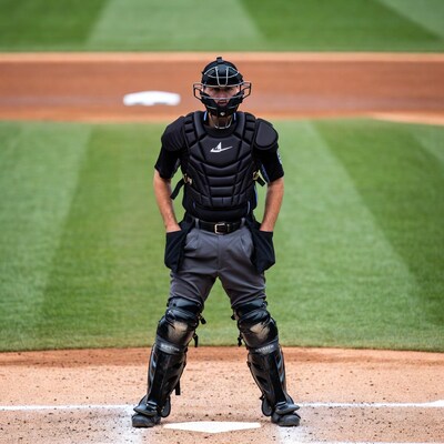 Baseball catcher standing on home plate