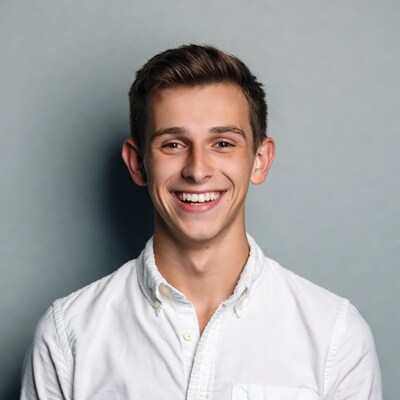 Smiling young man in white shirt