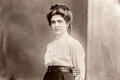 Victorian woman in white blouse and skirt