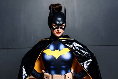 Woman in Batgirl costume