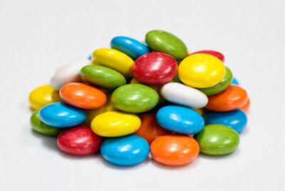 Colorful Candy Pile on White Background