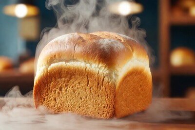 Fresh sliced bread loaf steaming