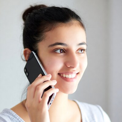 Young woman talking on phone