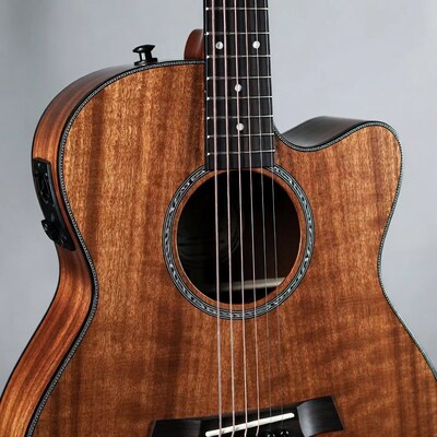 Brown koa cutaway acoustic guitar