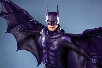 Purple Batman posing with wings spread
