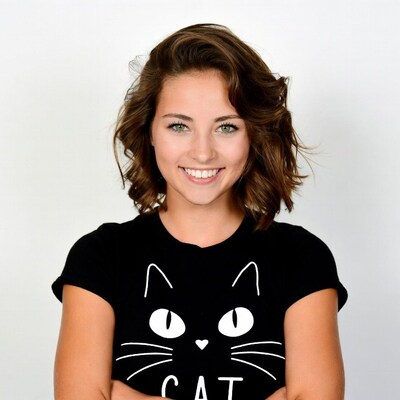Smiling woman in cat t-shirt