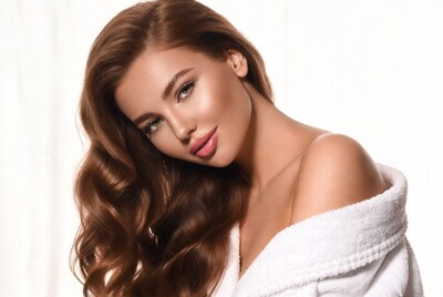 Beautiful woman in white bathrobe