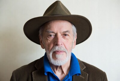 Elderly man wearing fedora hat