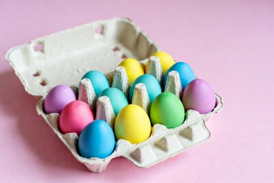 Colorful Easter Eggs in Cardboard Carton