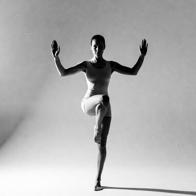 Woman performing tree pose yoga