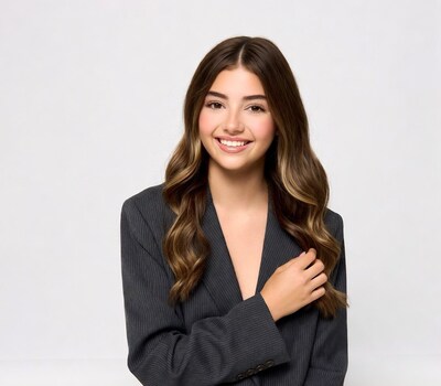 Smiling woman in gray blazer