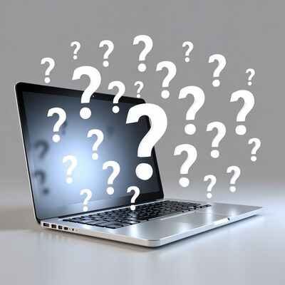 Laptop with question marks