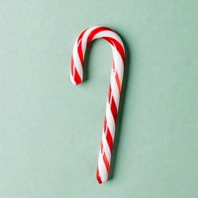 Red White Candy Cane on Mint Green Background