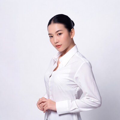Asian woman in white shirt profile