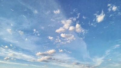 Blue sky with fluffy white clouds