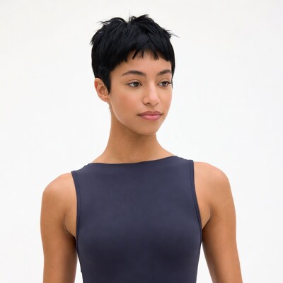 Profile of woman with short black hair