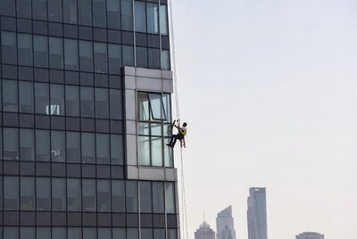 Window cleaner on skyscraper