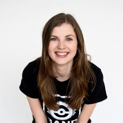 Smiling woman in black Band T-shirt