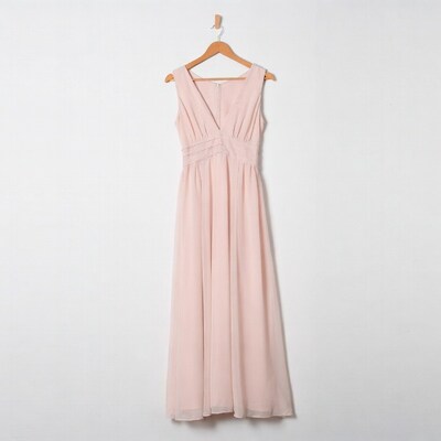 Pink chiffon dress on hanger