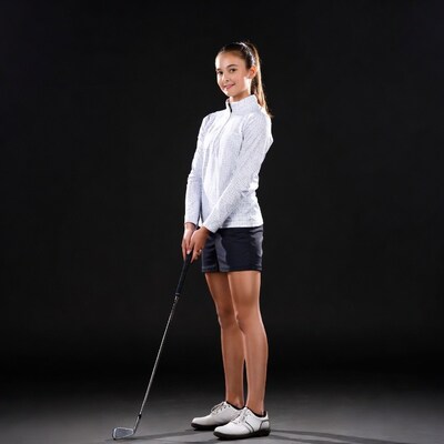 Young girl holding golf club