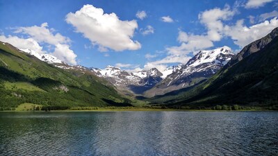 Snowy Mountains Reflecting in Alpine Lake