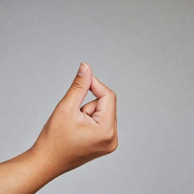 Hand making heart shape gesture