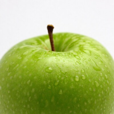 Fresh Green Apple with Water Droplets