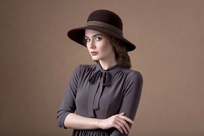 Woman in brown hat and dress