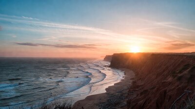 Sunset over Red Cliffs and Beach