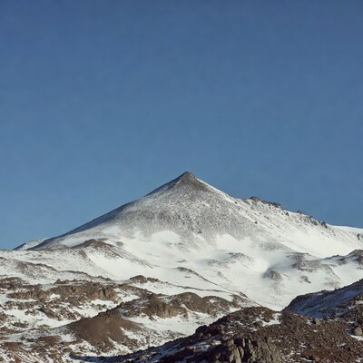 Snowy Volcanic Mountain Peak