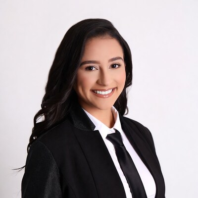Smiling Latina woman in black suit